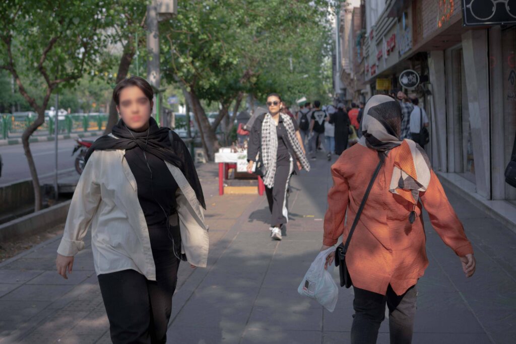 Women on Enghelab Street in Tehran, 2023.