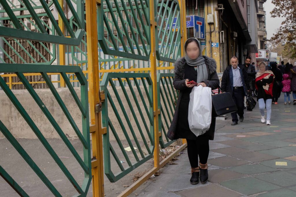 Young woman on Valiasr Street near Enghelab Street, Tehran, 2019 — from the Women in Public Space project